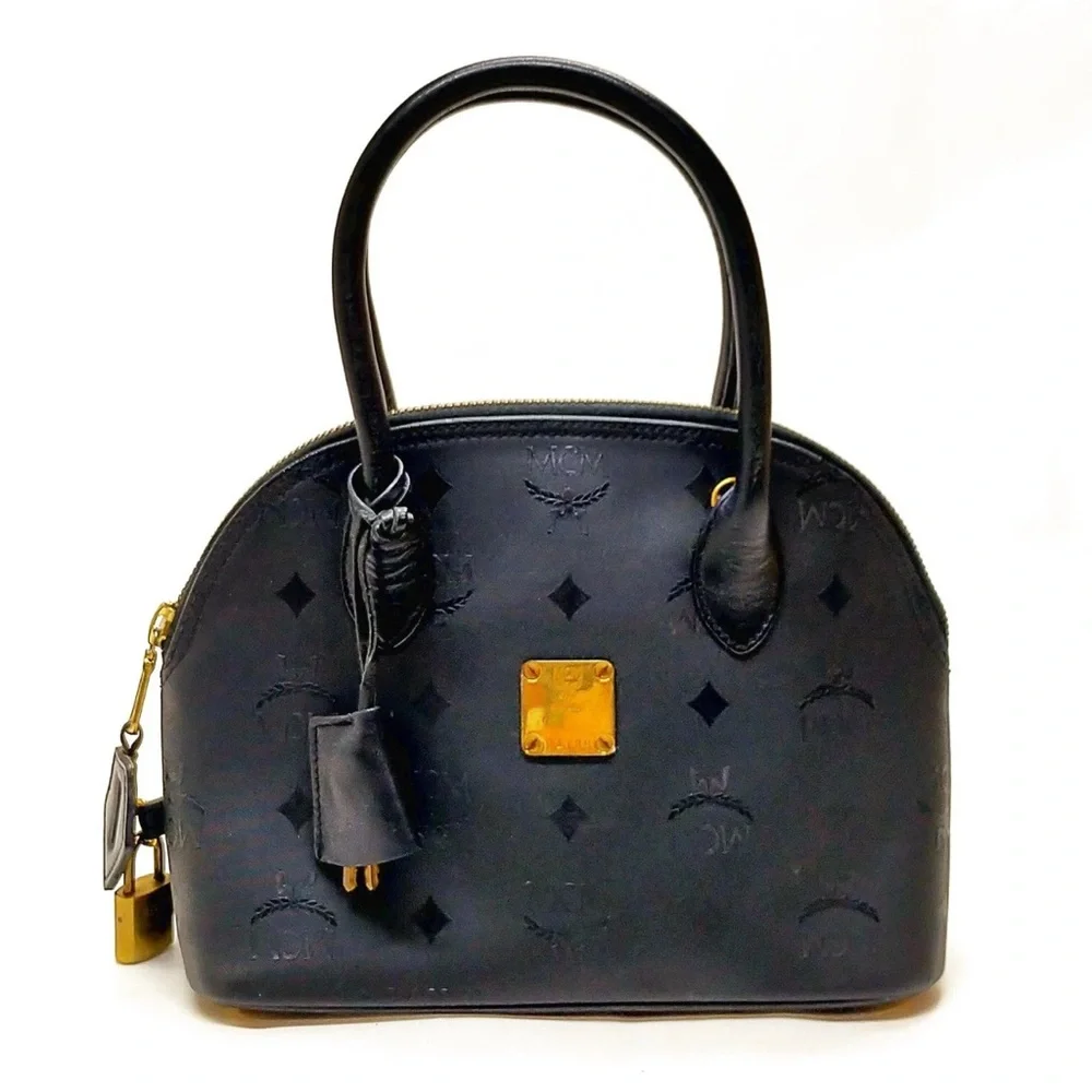 MCM Black Satchel with Gold Accents lock and key included authentic